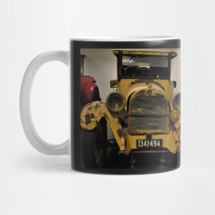 The yellow rusty vintage car Mug